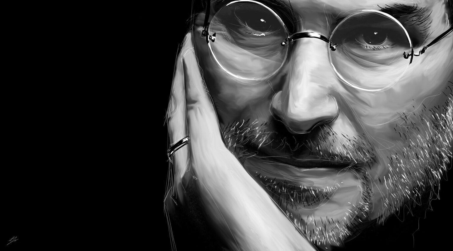 Steve Jobs en noir et blanc, poing contre la joue, lunettes rondes, sur fond noir.